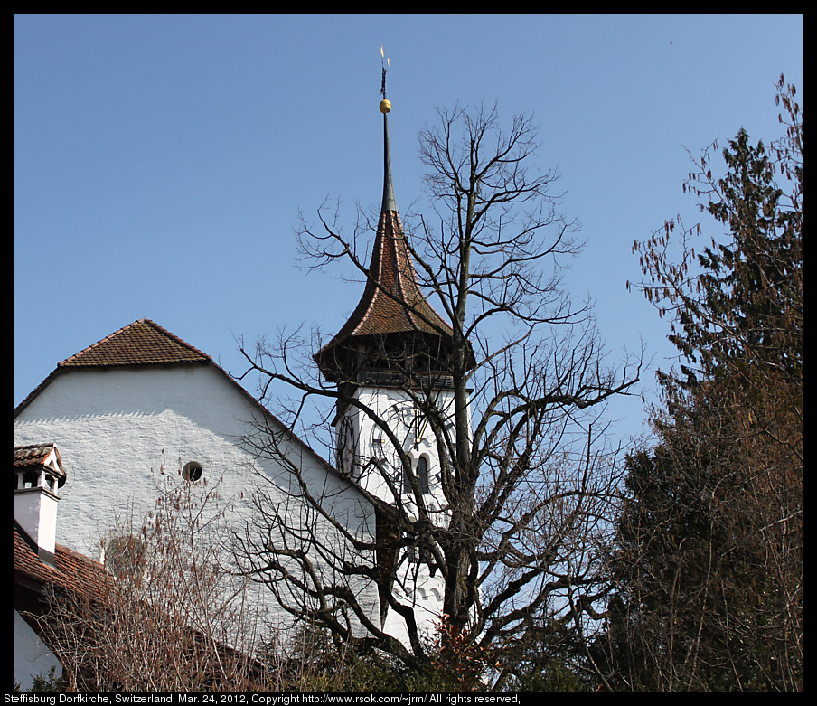 Church with a clock on its tower.